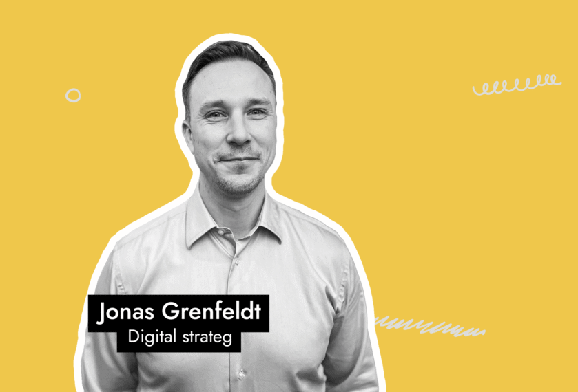 Jonas Grenfeldt vid gul bakgrund pratar om marknadsföring i lågkonjunktur